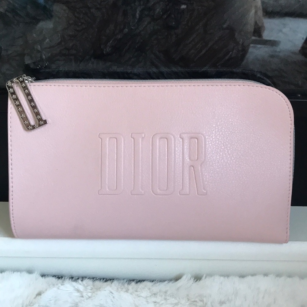 Dior Make up bag in light pink, zipper pull has the D logo